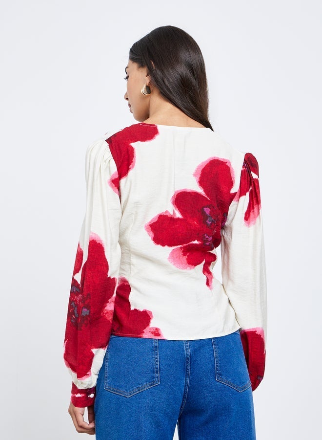 ستايلي بلوزة بطبعة زهور ونمط لف - Image 4